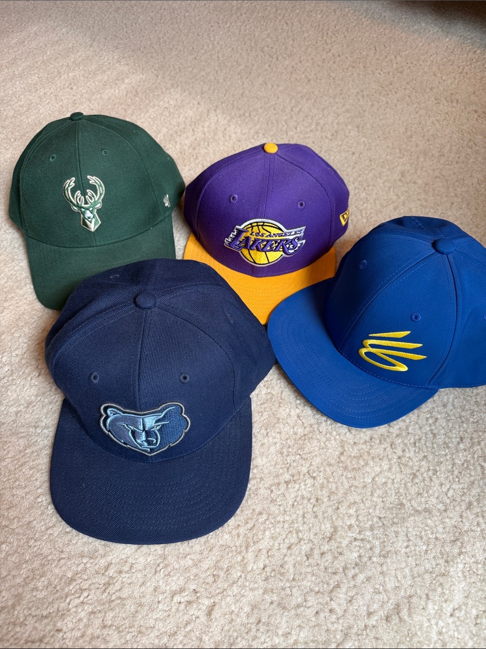 Assorted Youth NBA Team Snapback Hats - Bucks, Grizzlies, Lakers, Curry